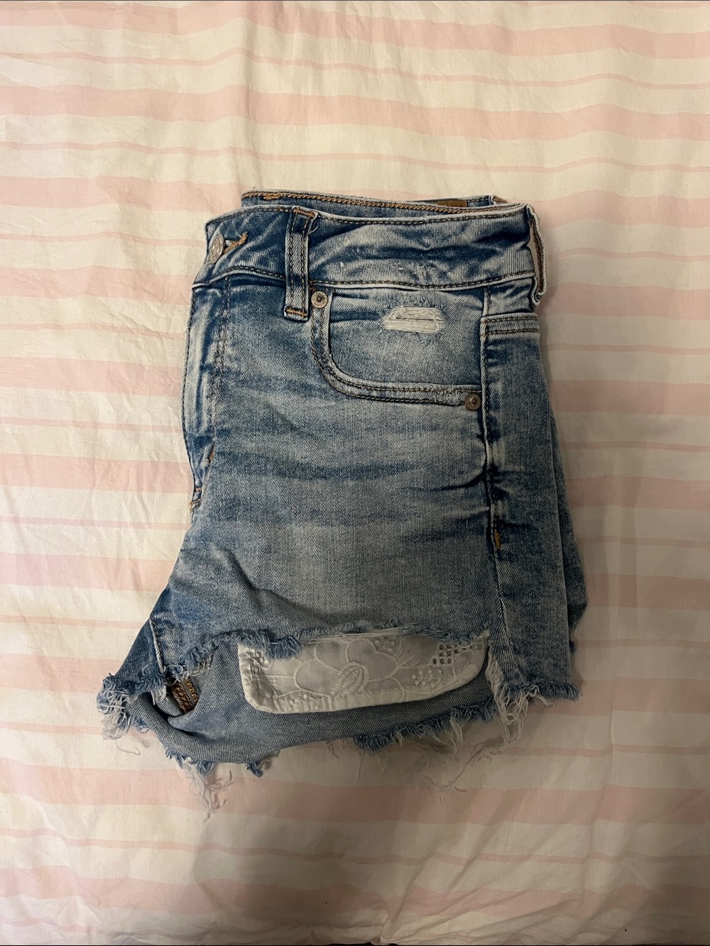 AE light wash jean shorts